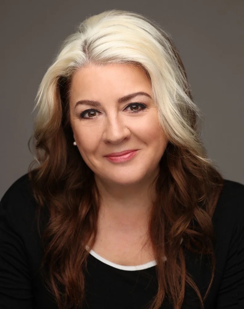 Portrait of Mandy Muden, a Comedian Magician