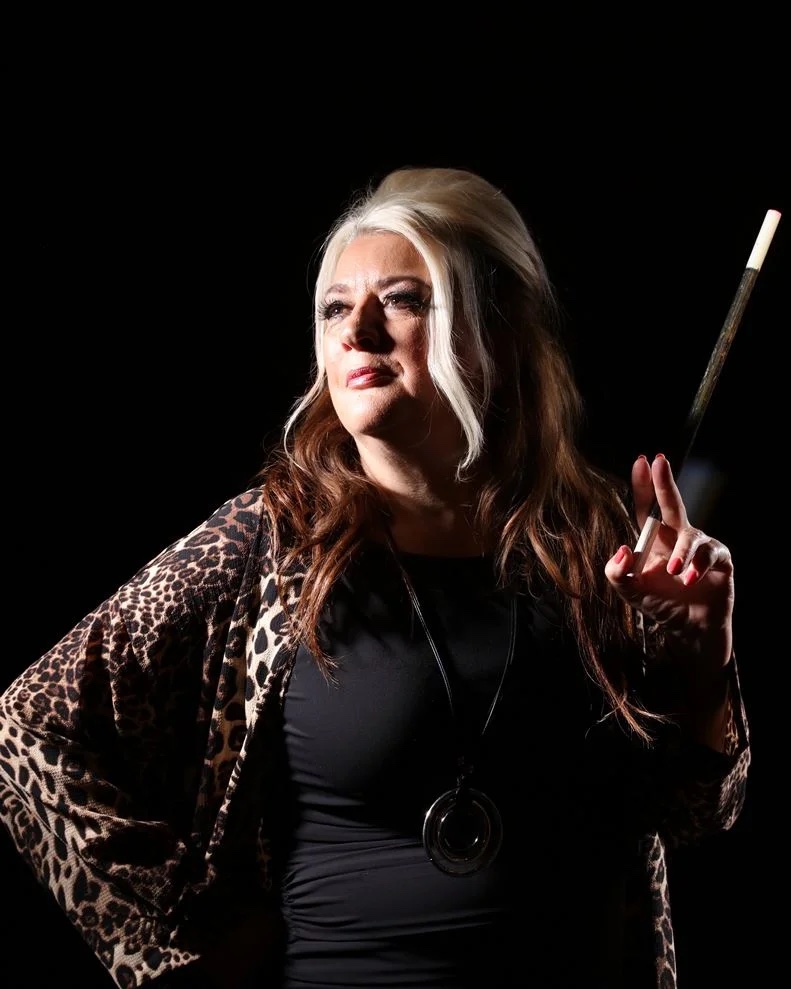 Portrait of Mandy Muden, a Comedian Magician