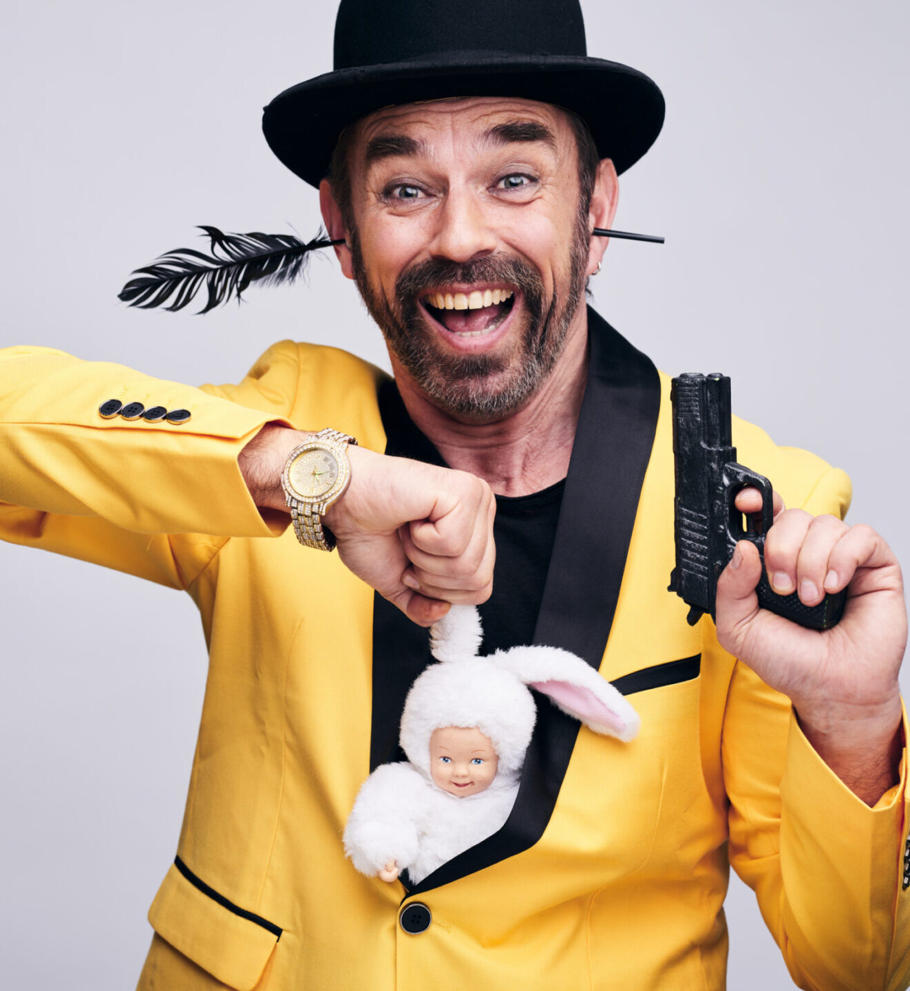 Comedy magician entertaining the audience with humor and magic tricks