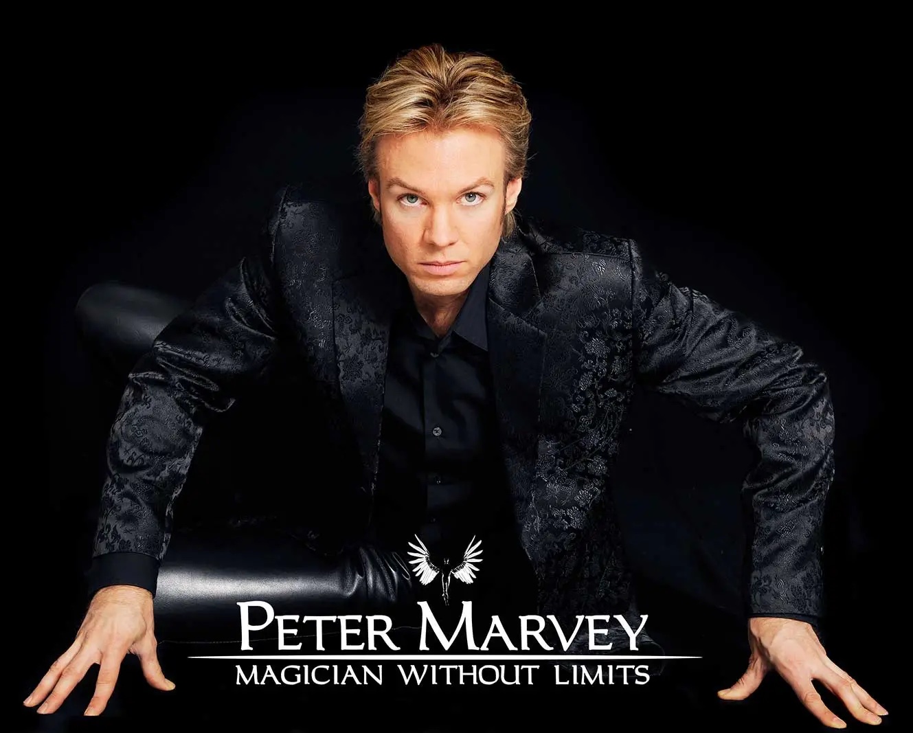 Peter Marvey Illusionist creating a mind-bending visual trick on stage at a Ministry of Magic show