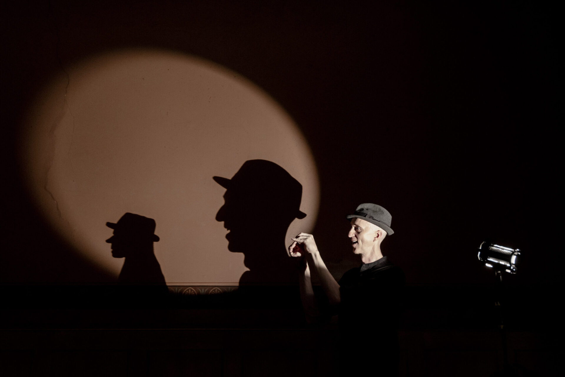shadows from Drew Colby, a man in a hat