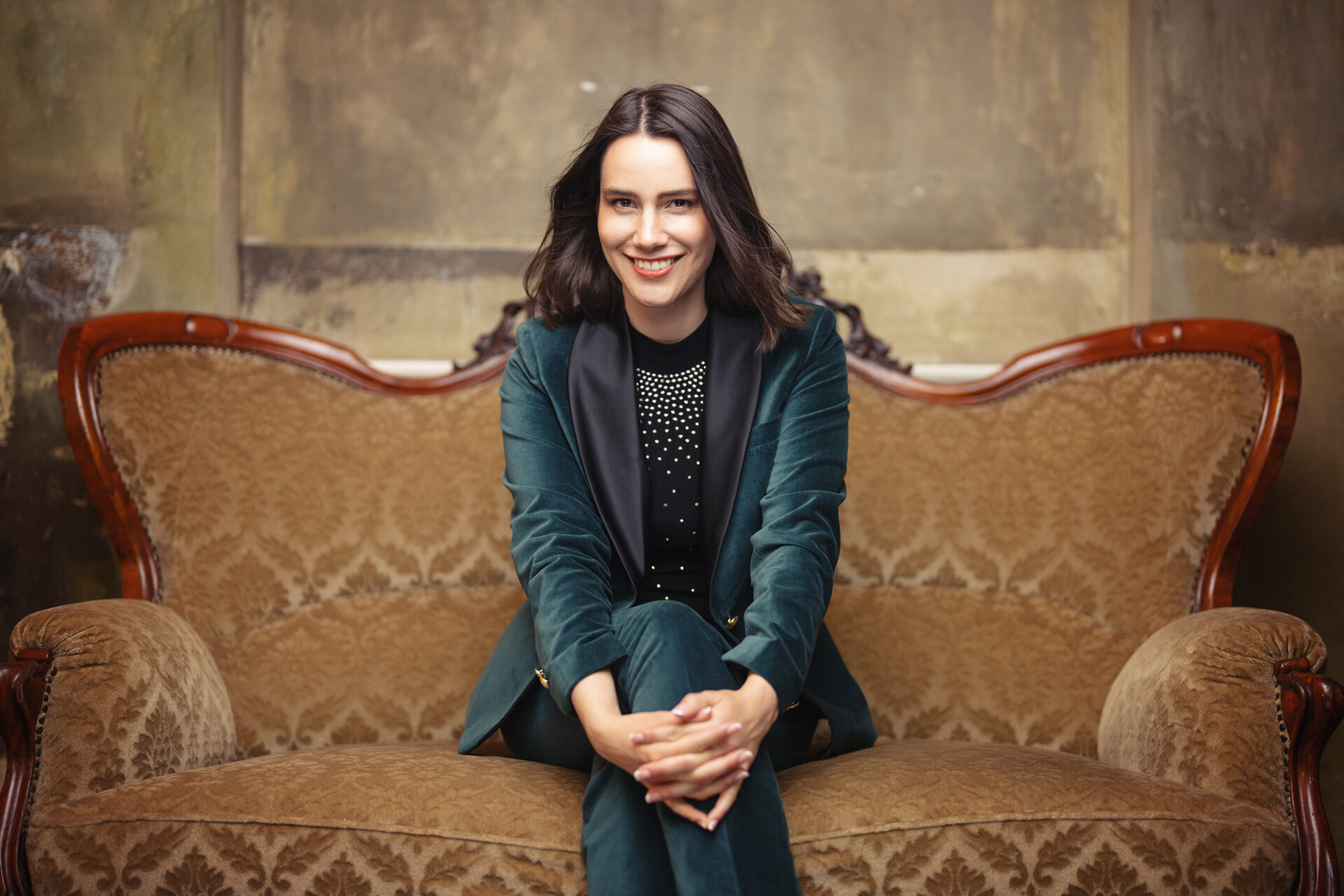 Allison sitting on sofa